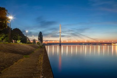 Deep sunset panoramic scene over Daugava river in Riga, Latvia. New business Stock Photos