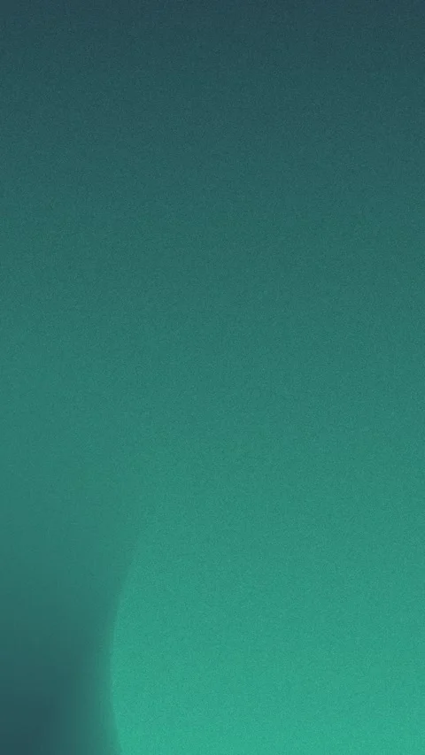 Deep teal grainy gradient with soft circular glow. Seamless loop background. 4K. Stockbeeldmateriaal 309701646