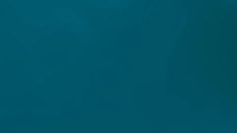 Deep teal seamless loop background with soft gradient texture. 4K. Video stock 300840503