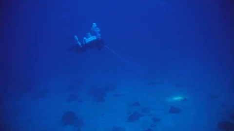 A deep technical diver has a set of doubles or twin set Video stock 128620525