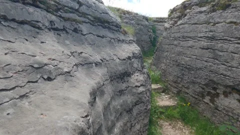 Deep Trench in the Limestone Rocks of Lessinia High Plateau, Italy Stock Footage 337880306