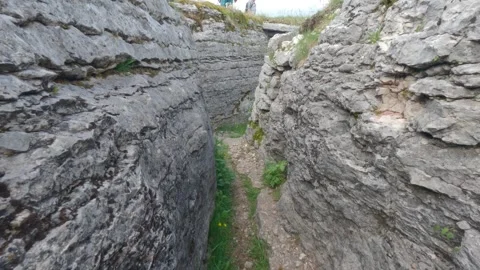 Deep Trench in the Limestone Rocks of Lessinia High Plateau, June 15, 2026 Stock Footage 337880723