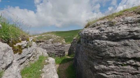 Deep Trench in the Limestone Rocks of Lessinia High Plateau, Italy Stock Footage 337880832
