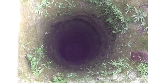 Deep tube cave view at mountain city Mangup Kale - Crimea Russia Stock Footage 73766016