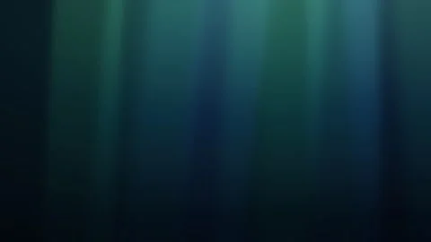 Deep underwater light rays shining through dark blue water Stock Footage 335938822