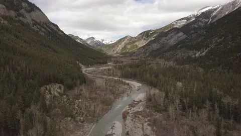 Deep valley with river in the middle Stock Footage 166431857