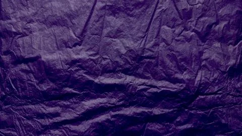 Deep violet crumpled paper texture unfolds mysterious elegance Stock Photos