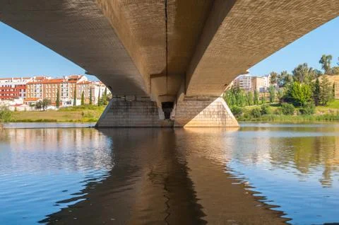 Deep vision under the bridge over the Guadiana river Stock Photos