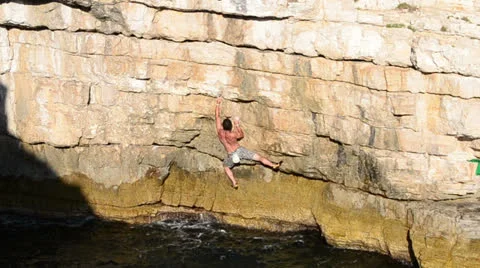 Deep water solo climber long shot Stock Footage 24832697