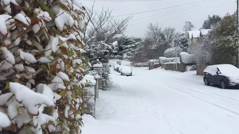 Deep White Winter Snow conceals a traditional English Lane (HD, Slo-Mo) 库存影片 84676774
