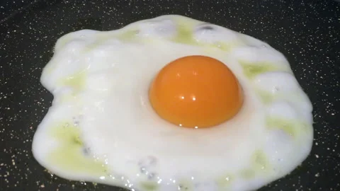 Deep Zoom In A Frying Egg Stock Footage 161539301