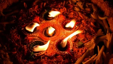 Deepabali - colourful candles are lit in darkness Stock Footage