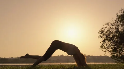 Deepening the connection with nature through the practice of yoga. Experience Stock Footage 284712881