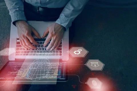 Deepfake technology demonstration using a laptop and various digital graphics Stock Photos