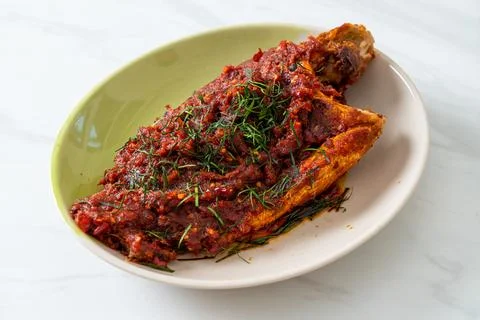 Deepfried fish and chili sauce Stock Photos