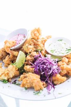 Deepfried tempura seafood modern fusion gourmet food cuisine meal Stock Photos