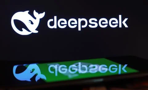 Deepseek logo reflection on screen display Stock Photos