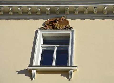 Deer bas-relief over the window. Baden near Vienna. Vein. Austria Stock Photos