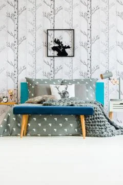 Deer clock in bedroom interior Stock Photos