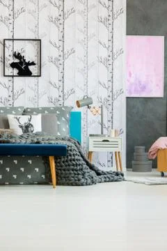 Deer clock in bedroom interior Stock Photos