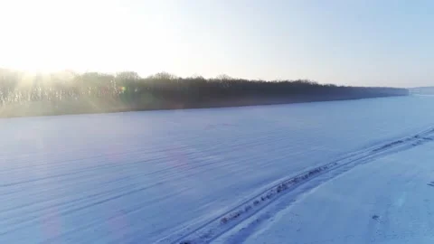 Deer Footsteps in Fresh Snow Winter Time on a Field Drone Aerial Shot Stock Footage 139717264