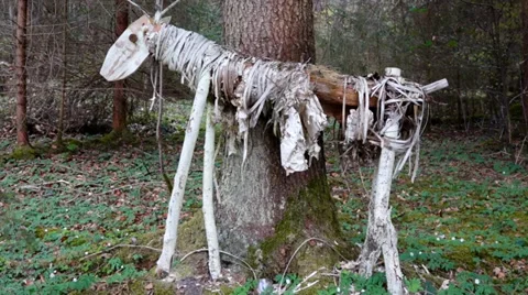 Deer sculpture in a forest Video stock 37429583