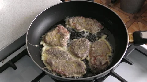 Deer steaks are being fried in a pan.  healthy food concept Stock Footage 154045741