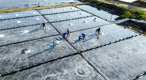 Default People working on the Hon Khoi Salt Fields in Doc Let near Nha Trang, Stock Photos