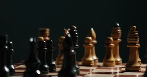 Defeat chess player resigns by knocking over his king with his hand Stock Footage 131084830