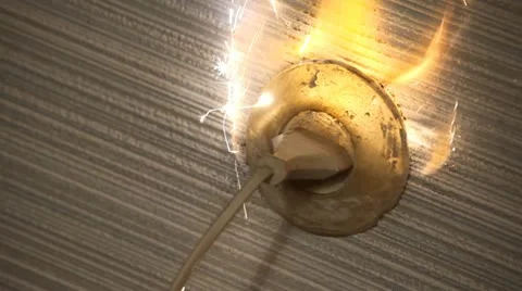 Defective socket on fire Stock Footage 20198692