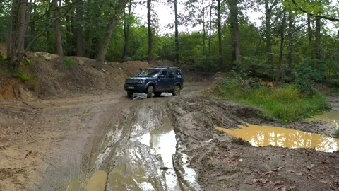 Defender Crossing water mud Stock Footage 163270822
