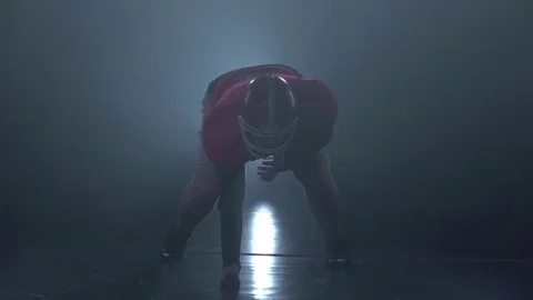Defender preparing to attack, dark studio background. Slow motion Stock Footage 73397735