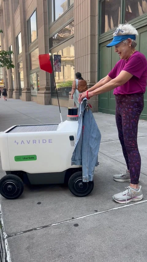 Defiant Retiree Blocks Delivery Robot, Philadelphia, Pennsylvania, USA - 15 Jul  Stock Footage 346177456