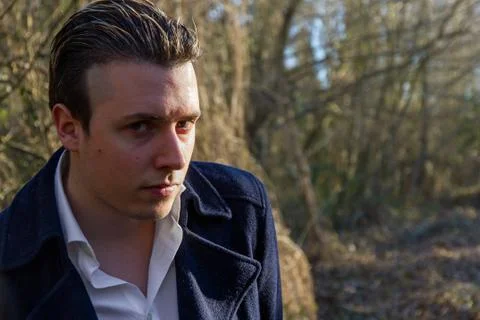 Defiant Young Looking at Camera Stock-Fotos