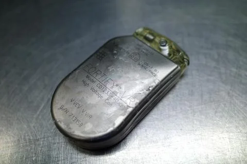 A defibrilator was explanted because the battery was in danger of bursting Stock Photos