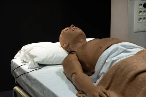 Defibrillator on a dummy doll for practice. Cpr dummy for training purposes 스톡 사진