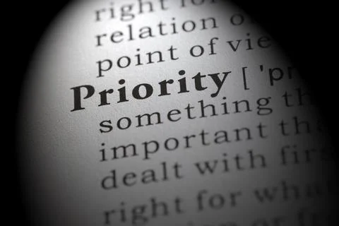 Definition of priority Stock Photos