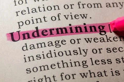 Definition of undermining Stock Photos