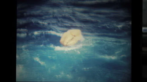 Deflated lifeboat floating in Ocean Stock Footage