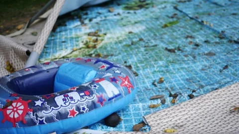 Deflated or Broken Pool Series - Close up of Mossy Pool Liner 2 스톡 동영상 346567141