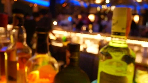 Defocus of bartender mix and serve cocktail alcoholic beverage drink at bar Stock Footage 237458120