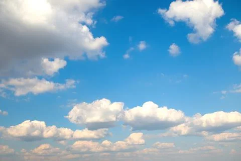 Defocus blue sky background with tiny white clouds. Panorama blue sky background Stock Photos