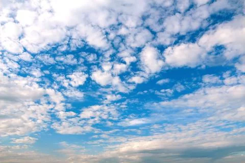 Defocus blue sky background with tiny white clouds. Panorama blue sky background Stock Photos
