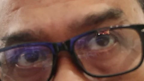 Defocus blur front view over the shoulder shot of worker with computer. Stock Footage 294736033