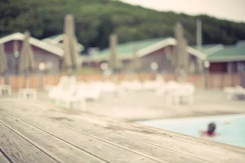 Defocus blurred background recreation base wooden houses pool sunbeds wooden  Stock Photos
