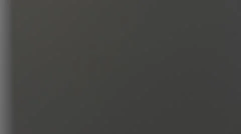 Defocus of businessman using tablet and drinking coffee while walking through Stock Footage 64774584