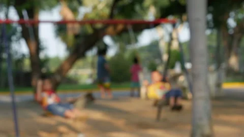 Defocus of children is playing at the playground Stock Footage 131198679