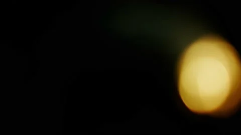Defocus circles of bokeh lights moving and blinking in night darkness. Stock Footage 162993977