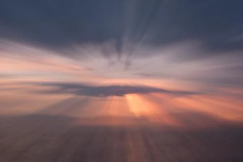 Defocus dramatic sunset with zoom-out effect Stock Photos