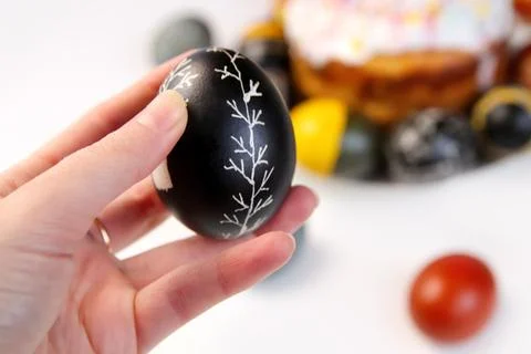 Defocus Easter black egg with tree ornament. Easter cake craffin. Close up .. Stock Photos